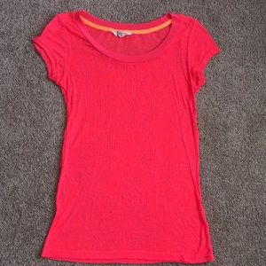 Neon orangey shirt with a light zebra print